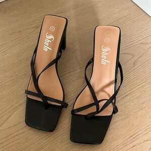 Strappy black heels